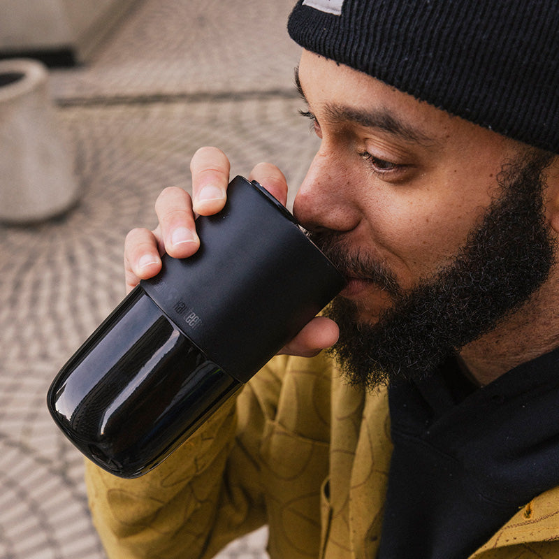 16oz-rise-tumbler-l4 16oz_rise_tumbler_black_man_drink_square.jpg