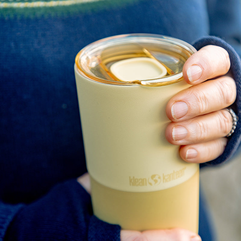 daily-on-the-go-set-j9 16oz_rise_tumbler_wax_yellow_closeup_hand_lid_square.jpg