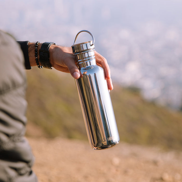27oz-reflect-with-bamboo-cap-j9 K27SSLRF-MS-BAMBOO_reflect_bottle_hand_lifestyle.jpg