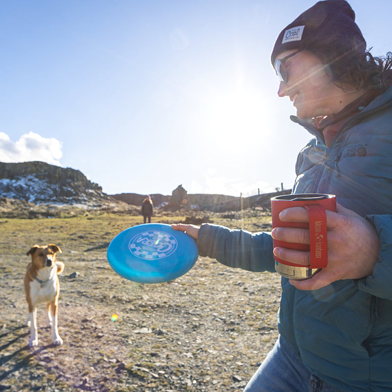 12oz-camp-mug-u5 insulated_camp_mug_12oz_woman_dog_frisbee_square.jpg
