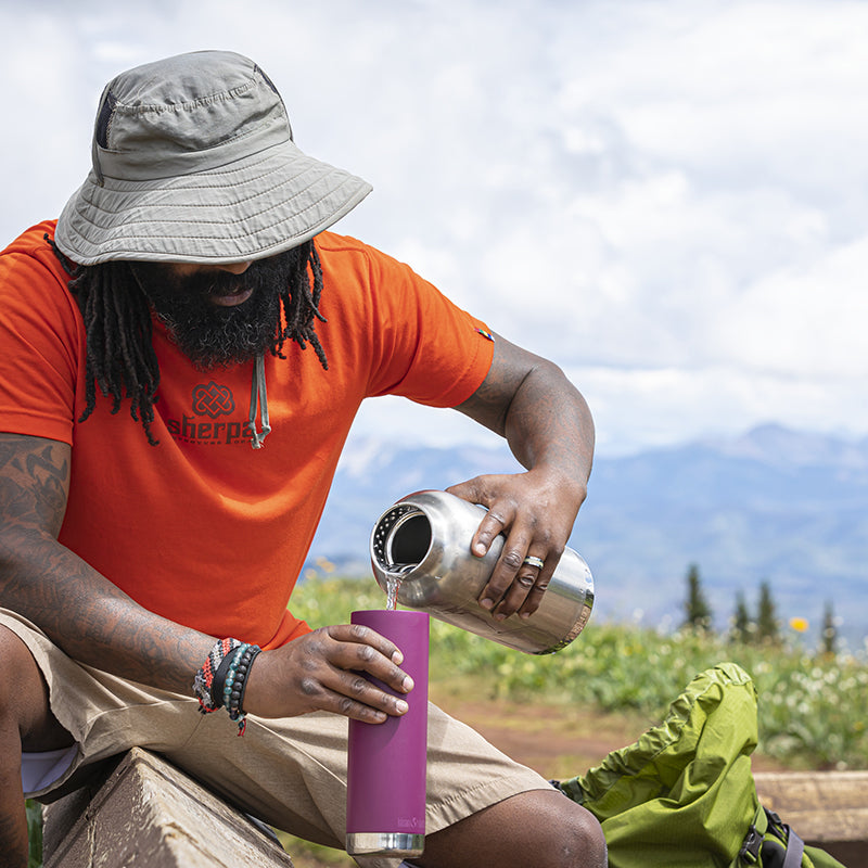64oz-tkwide-with-loop-cap-l8 tkwide_64oz_bottle_backpacker_mountains_filling_square.jpg