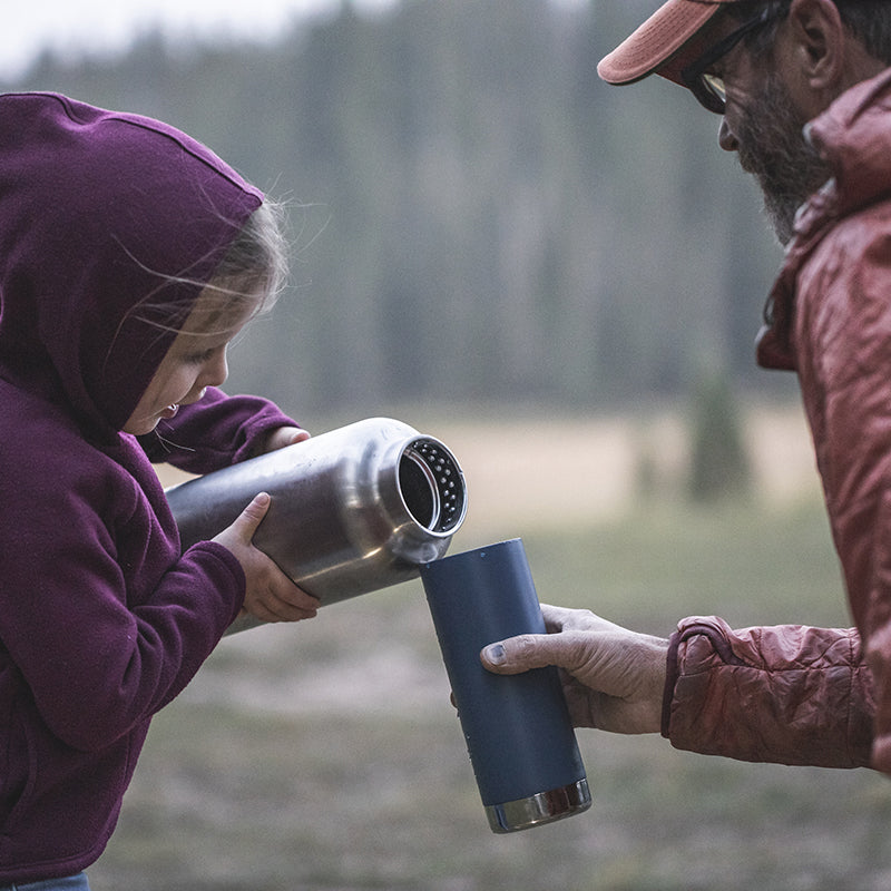 64oz-tkwide-with-loop-cap-l8 tkwide_64oz_bottle_girl_dad_filling_square.jpg